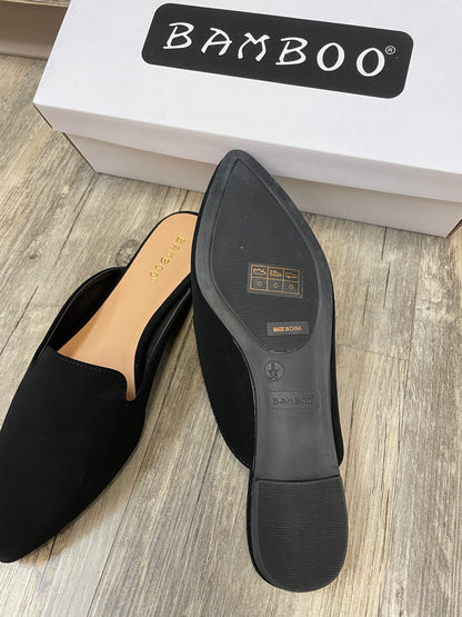 Black flat mules