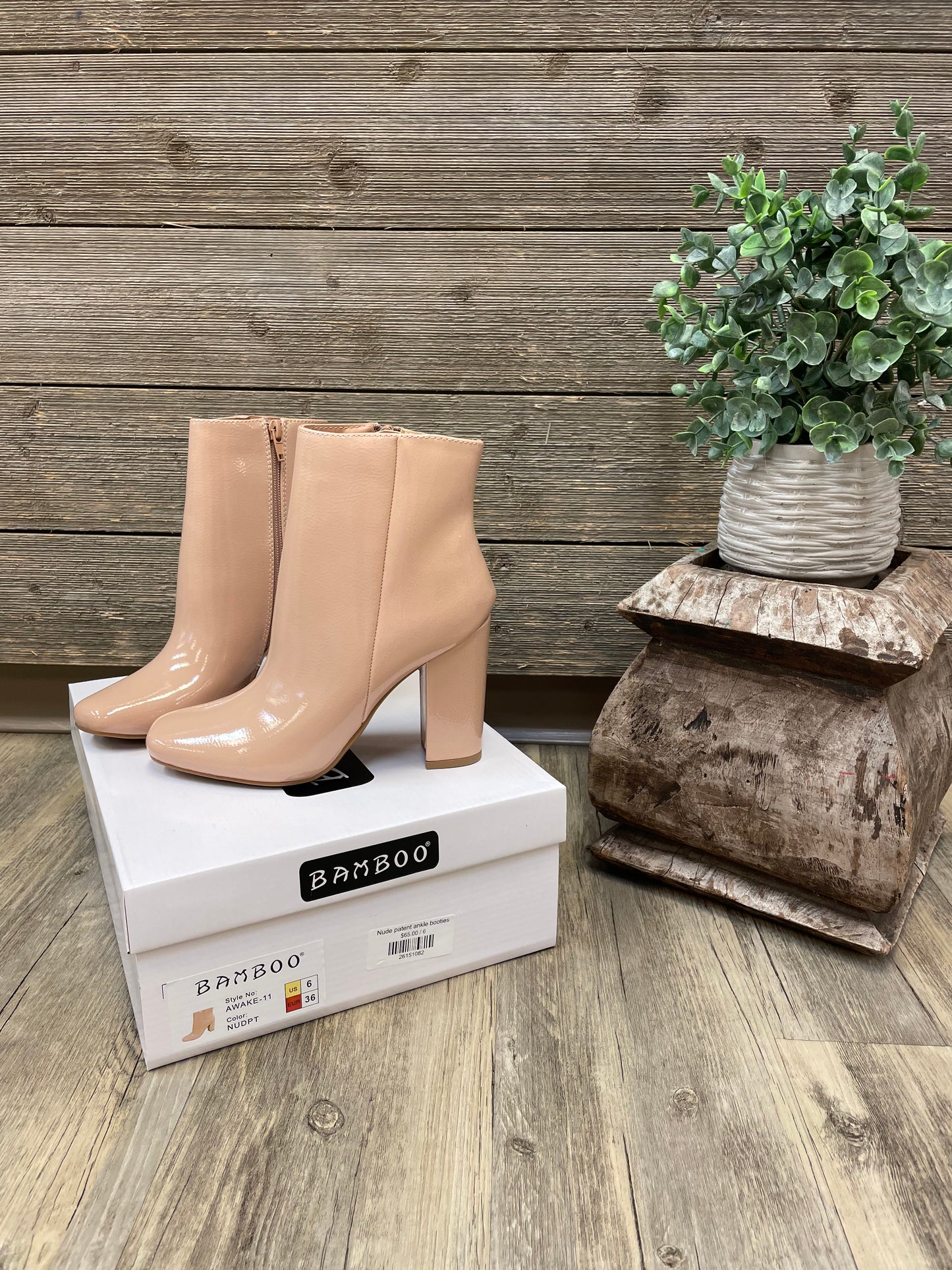 Nude patent ankle booties