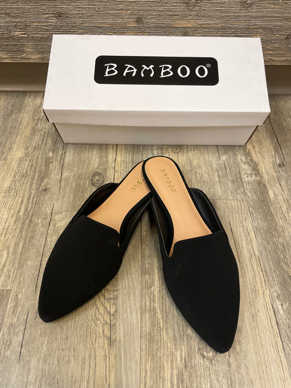 Black flat mules