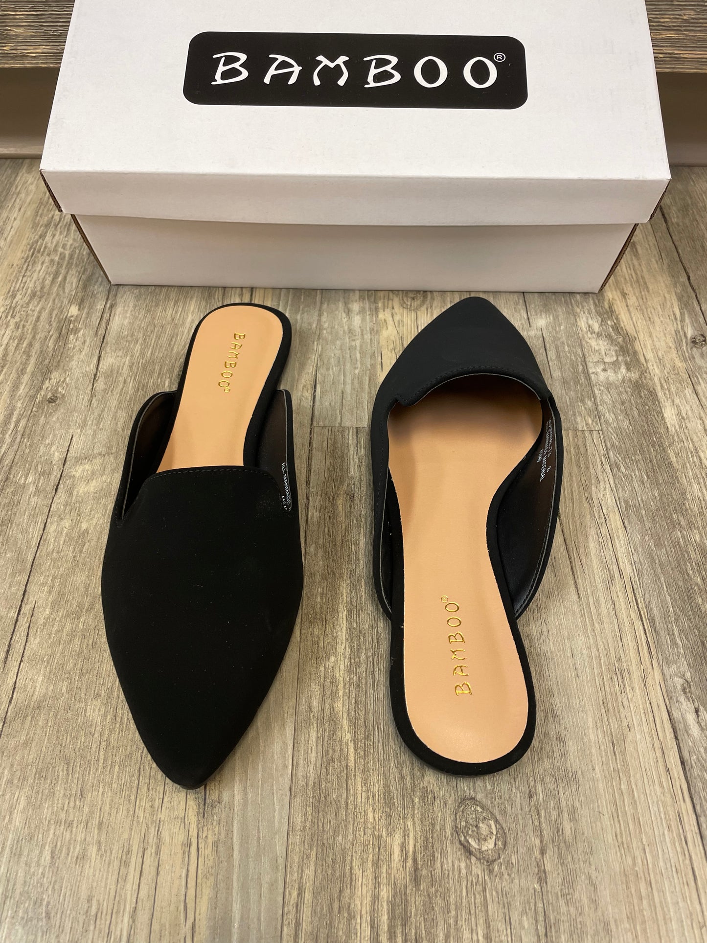 Black flat mules