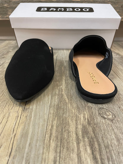 Black flat mules