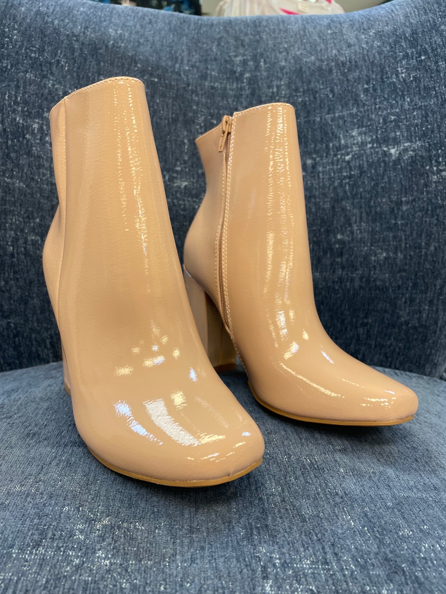 Nude patent ankle booties