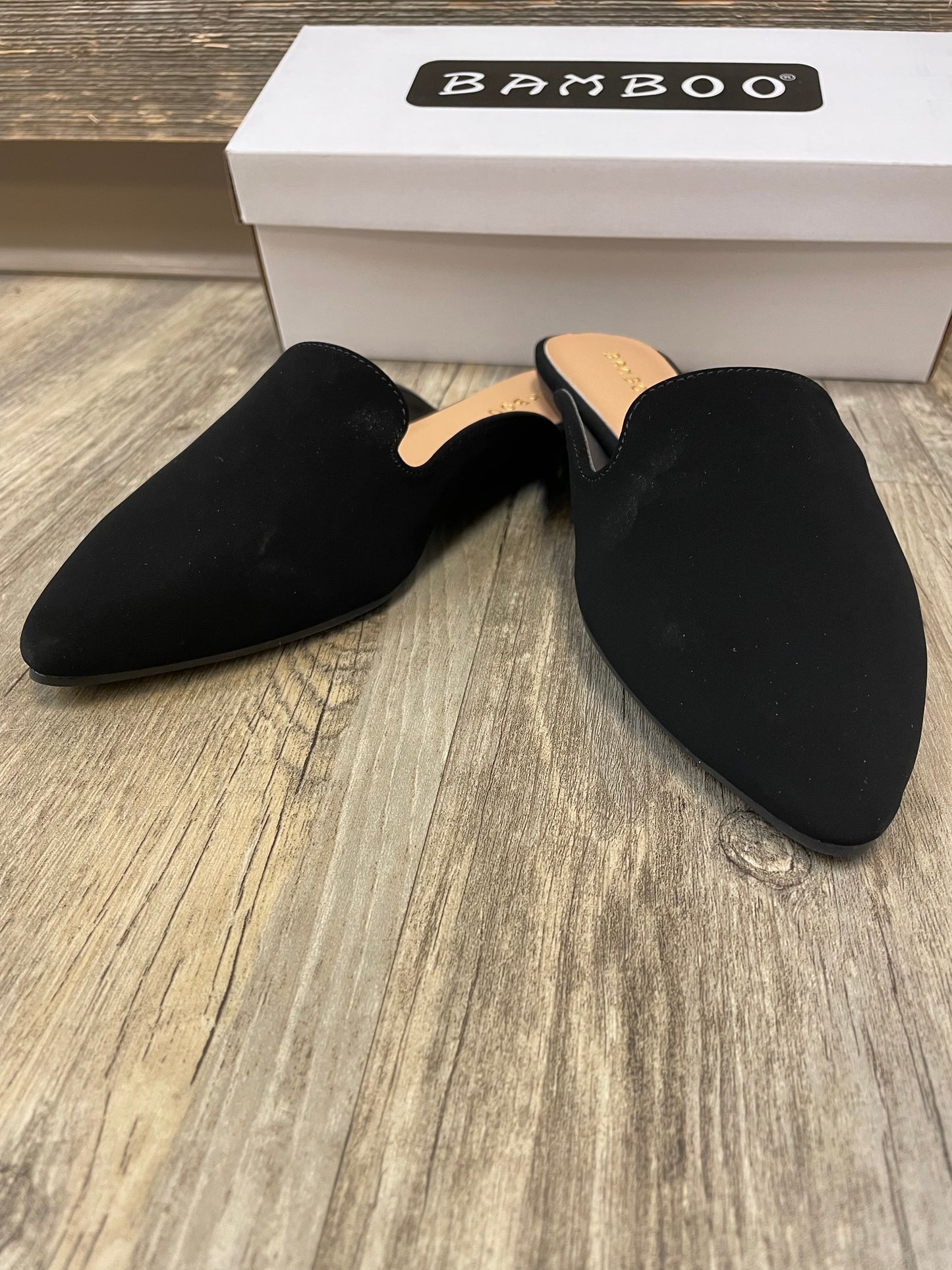 Black flat mules