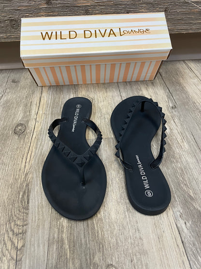 Black studded flip flops