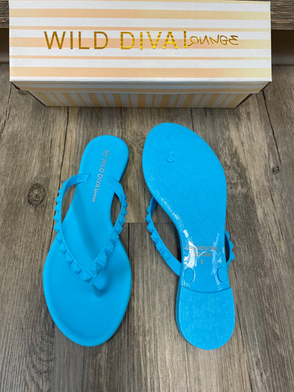 Blue studded flip flops