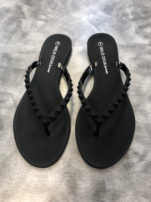 Black studded flip flops