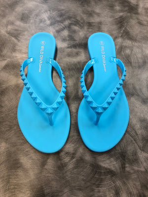 Blue studded flip flops